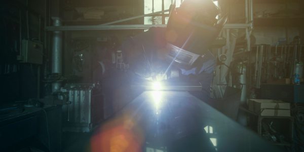 welder-soldering-iron-in-workshop-UNJ7ZDQ.jpg